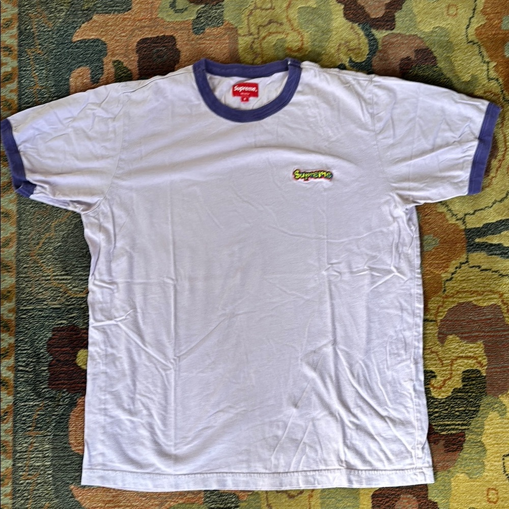 Supreme Lavender ringer T, good condition. comic logo. size S